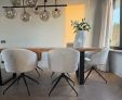 Kick swivel chair Merle - Champagne